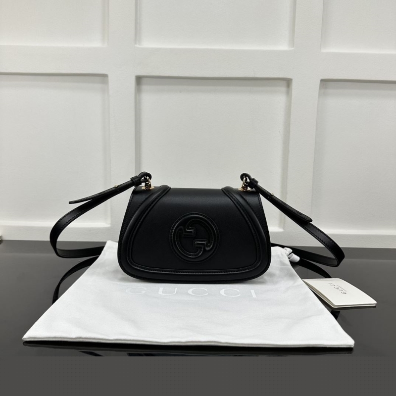 G*u*i satchel bags